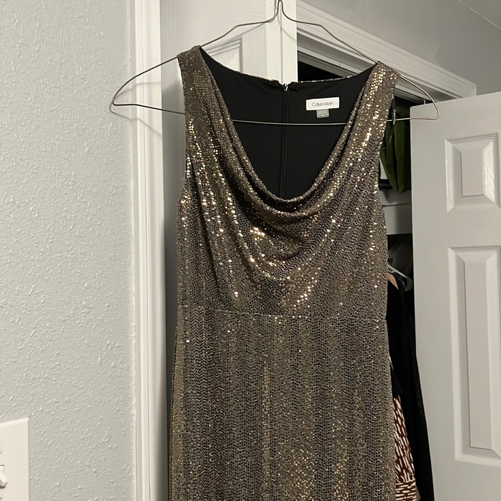 Brand new Calvin Klein dress floor length . Size 4 but fits between 4-6